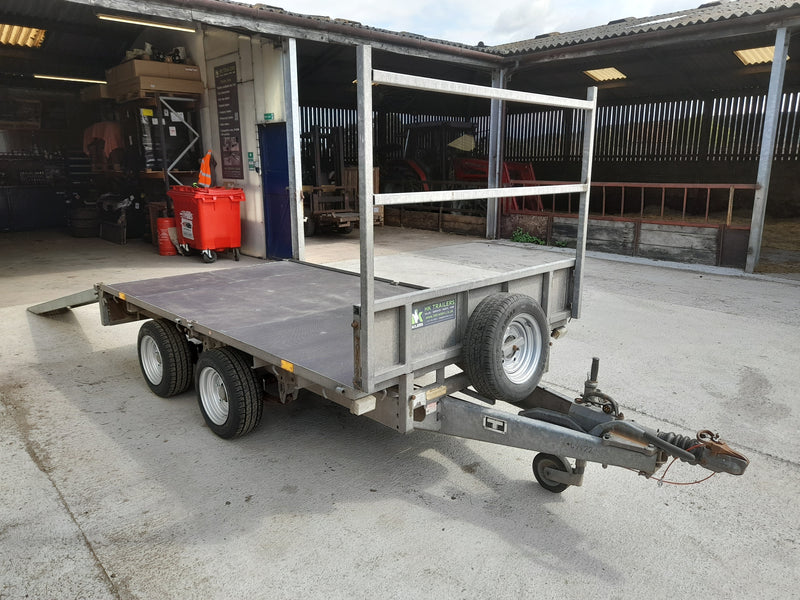 Ifor Williams LM105 10ft Flatbed Trailer for Hire, Side View with Loading Ramps