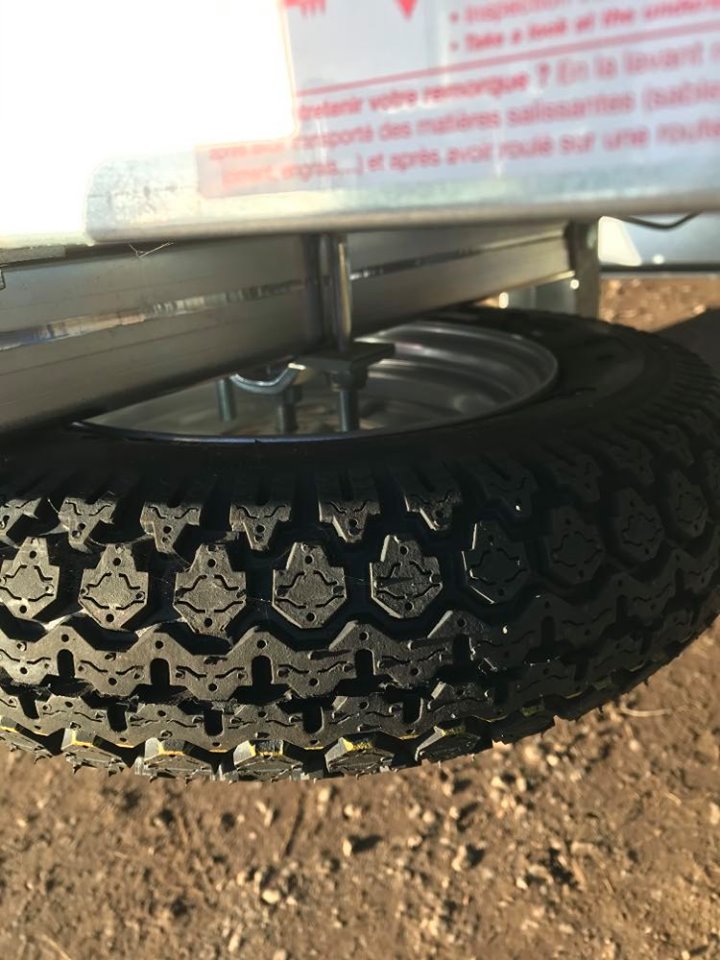 3.50 x 8 wheel and tyre assembly fitted to underside of Erde 102 trailer 